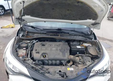 2021 Toyota C-Hr Le z USA, uszkodzony, nr VIN JTNKHMBX8M1109207